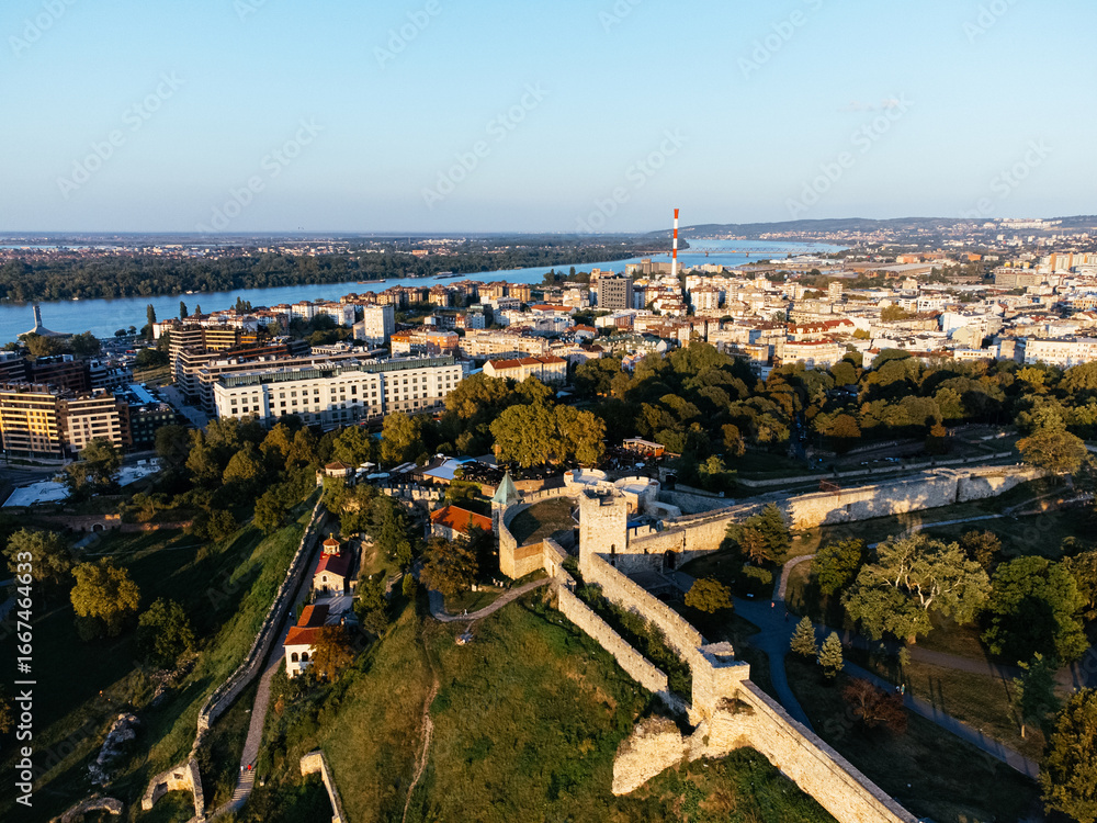 Obraz premium Aerial view over Belgrade's Kalemegdan fortress and river panorama at sunset. g.