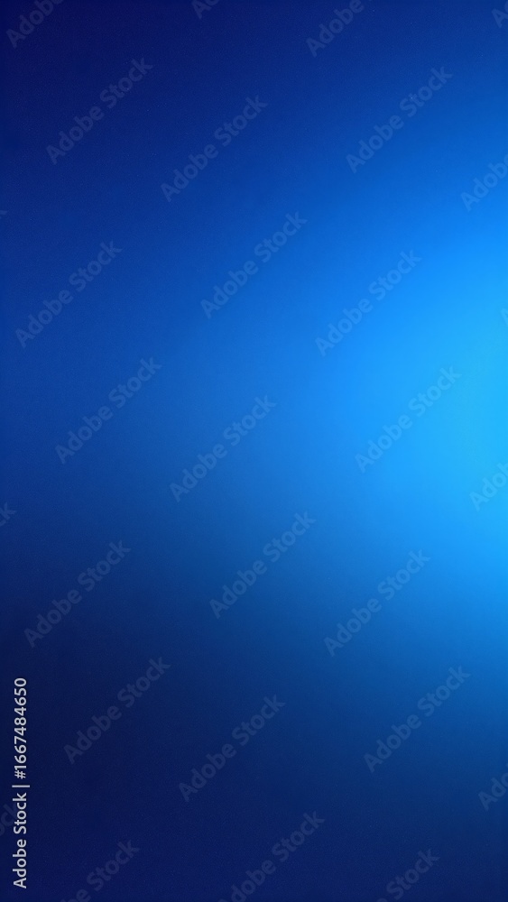 Fototapeta premium A serene blue background illuminated by soft, warm light from above.