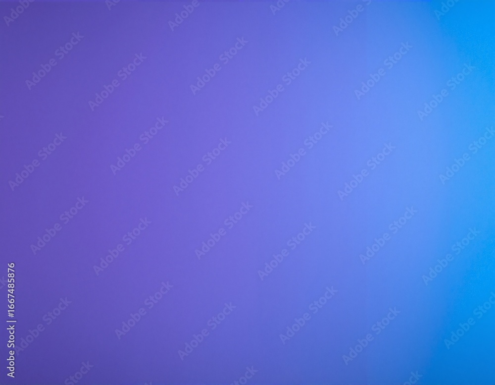 Obraz premium A vibrant blue wall adorned with subtle texture and shadows.