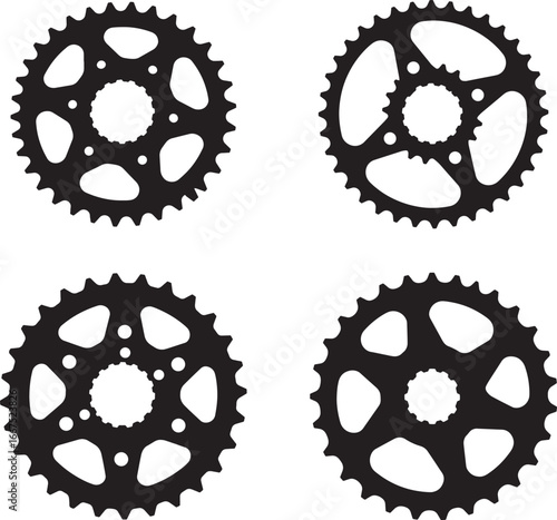 Four motorcycle sprockets in a black silhouette