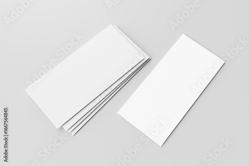 Stack of blank white DL flyers or brochures for mockup isolated on light grey background