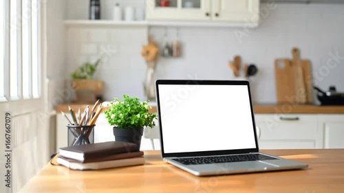 Wallpaper Mural Laptop on wooden table in modern kitchen. Torontodigital.ca