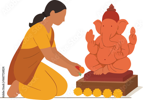 Woman offering flowers to Lord Ganesha statue during worship.
