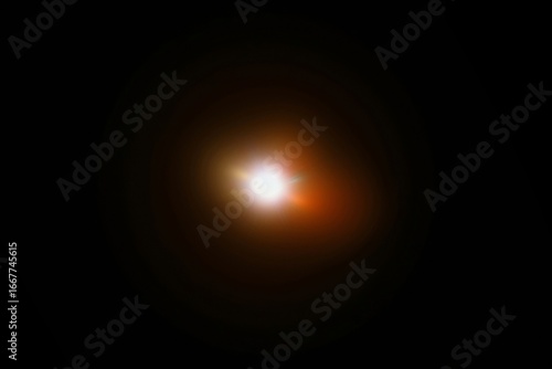 Bright Glowing Light Effect on Black Background – Abstract Lens Flare, Intense White and Orange Glow – Shining Light Burst in Darkness