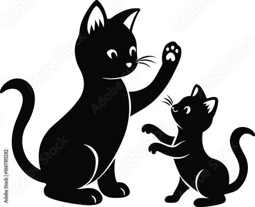 kitten pawing at another kitten playfully