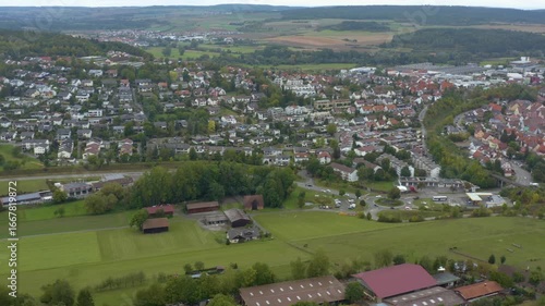 Aerial view of the old town city Weik der Stadt in Germany. On a cloudy day in Summer.