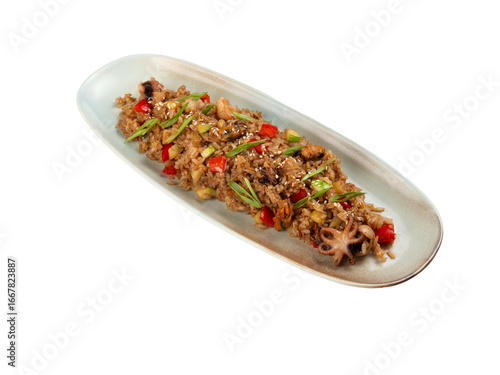 Rice with seafood in a plate. Transparent