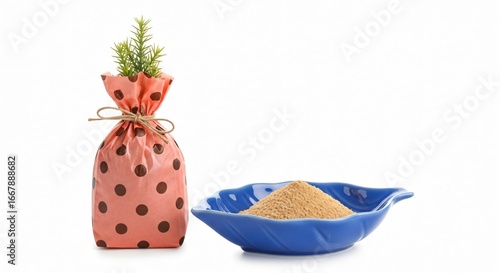 Unique gift with fresh greenery and a bowl of natural brown powder