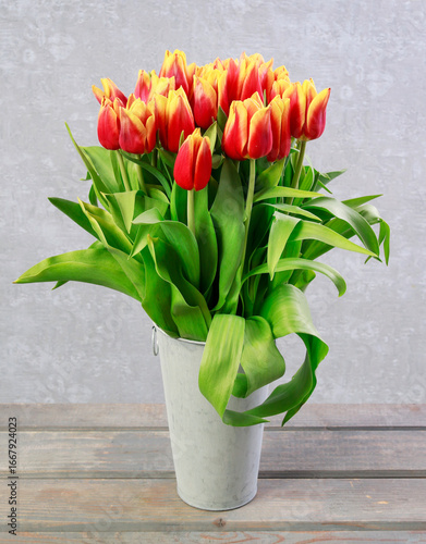 Huge bouquet of red and yellow tulips.