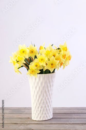 Wallpaper Mural Bouquet of yellow daffodils isolated on white background. Torontodigital.ca