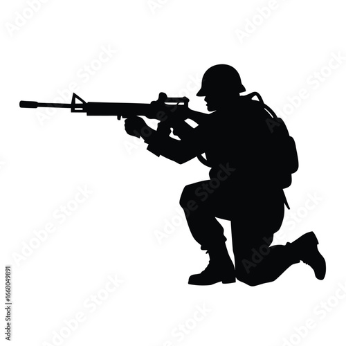 Soldier aiming rifle in crouched position military