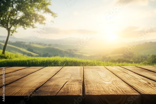Wooden table with sunny farmland view, rustic planks and a scenic background