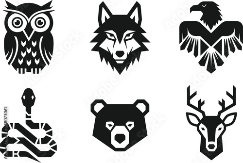A set of black and white animal vector icons. A collection of wildlife graphic symbols including an owl, wolf, eagle, snake, bear, and deer. Perfect for nature or brand designs.