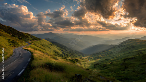 Sunset mountain road cutting across lush hills dramatic golden sky perfect nature travel backdrop
