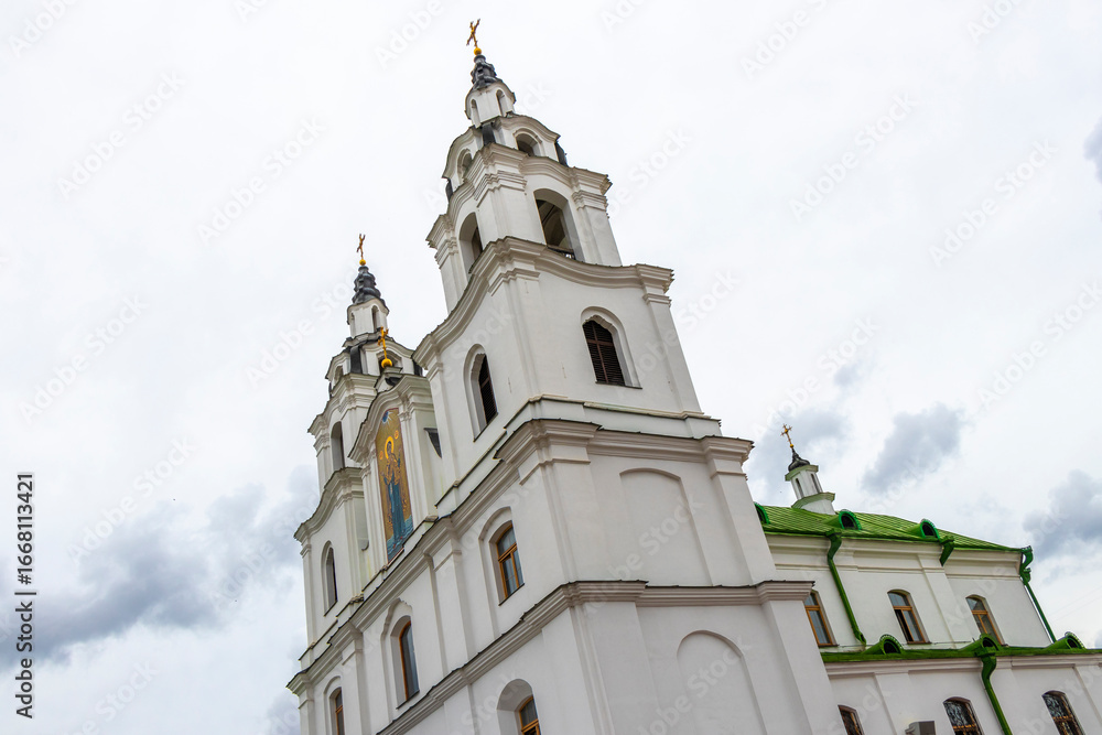 Fototapeta premium Holy Spirit Cathedral church and dark storm clouds in Minsk Belarus.
