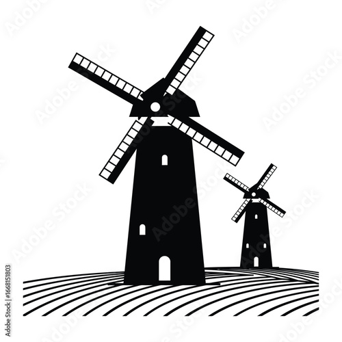 Two black windmills standing in a field with lines