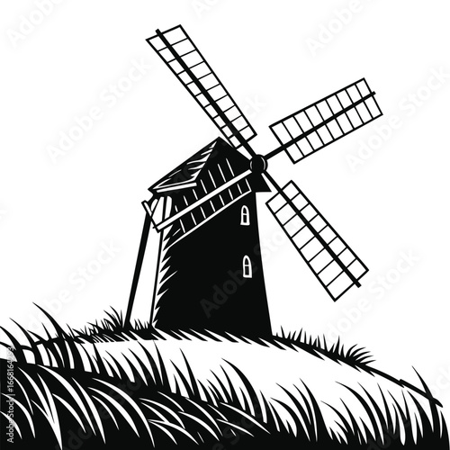 Ancient windmill in meadow silhouette