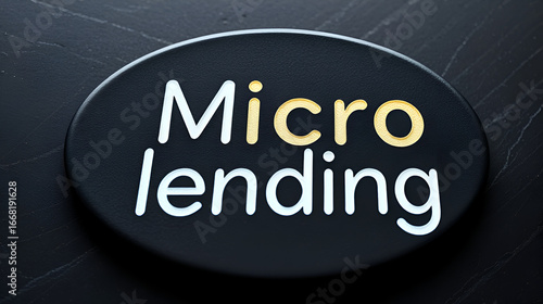 Microlending sign on the black plate. Micro loan concept.