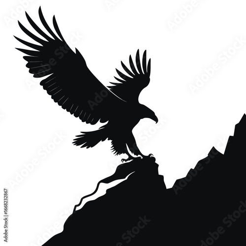 Eagle landing on rocky cliff silhouette