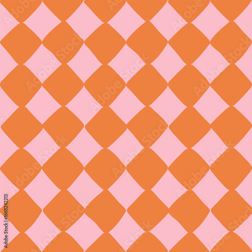 Seamless geometric pattern with orange diamond shapes on pink. Hand-drawn playful repeating background. Vector design for textile, wallpaper, wrapping paper, cover