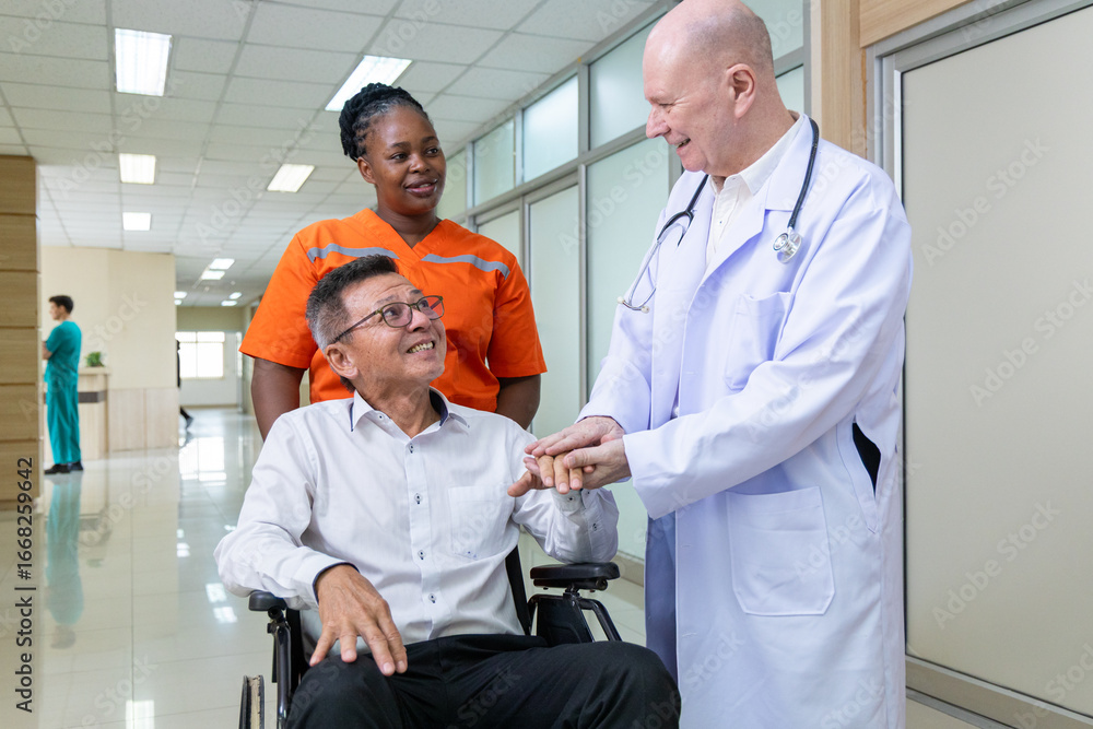 Fototapeta premium Doctor and nurse supporting happy recovering patient