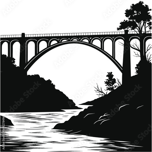 Ancient bridge over tidal river silhouette