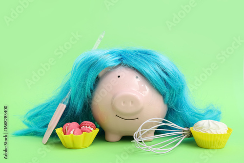 Piggy bank in wig and chef'...
