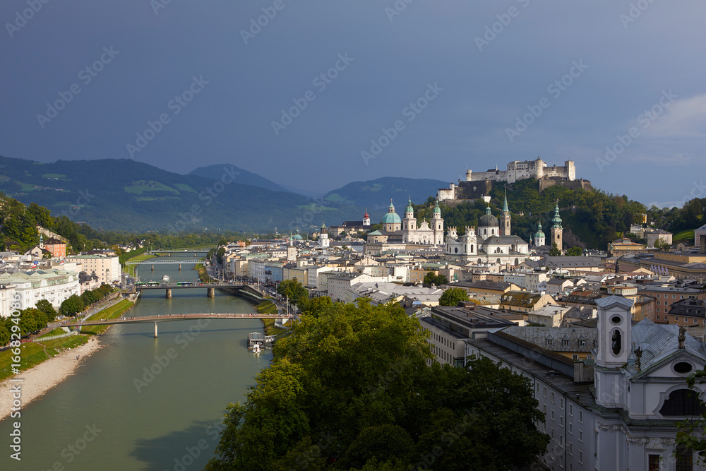 Fototapeta premium Cityscape of Salzburg with the historic Hohensalzburg Fortress on hilltop, Austria