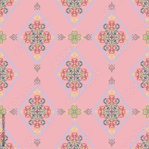 Pixel ethnic boho seamless pattern on a pink background. Traditional ornament. Tribal pattern. Folk motif. Can be used for wallpaper, textiles, and wrapping. Cross-stitch pattern.