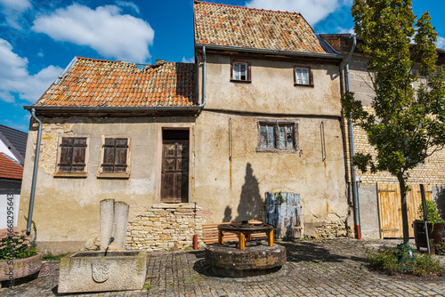 Fototapeta Naklejka Na Ścianę i Meble -  Old house in need of renovation in a small village in Rhineland-Palatinate