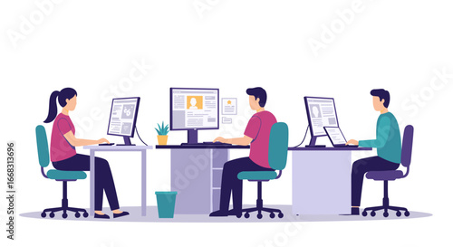 Office team working on computers in modern workspace