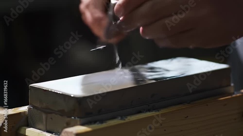 Closeup Knife Sharpening On Stone