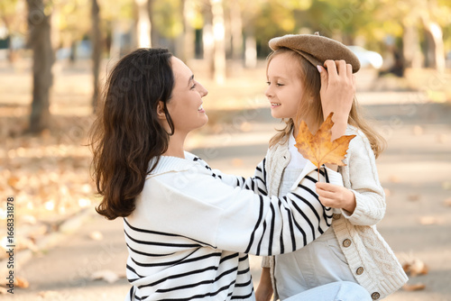 Happy mother with her cute ...