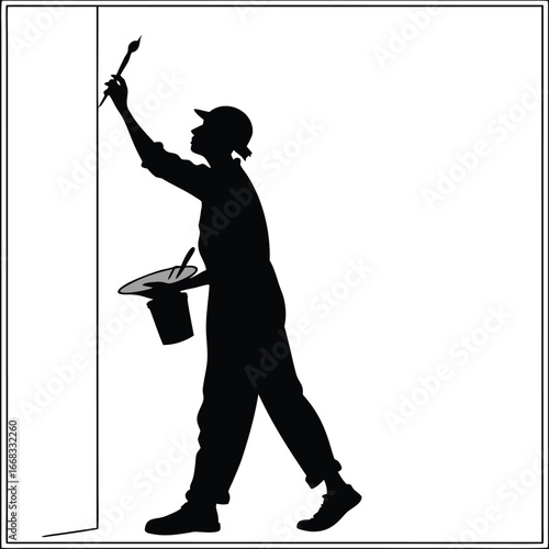 Artist painting mural silhouette