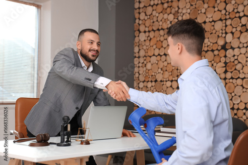 Male lawyer and client with...