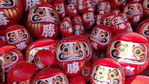 Collection of Daruma dolls at Katsuoji temple,  traditional Japanese wishing dolls.
