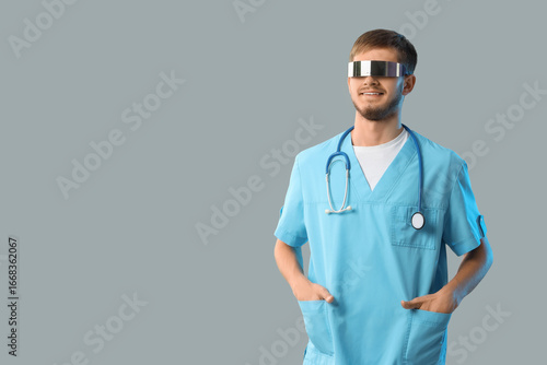 Male doctor in AR glasses on light background