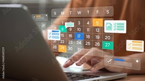 Person using a laptop with a transparent calendar overlay