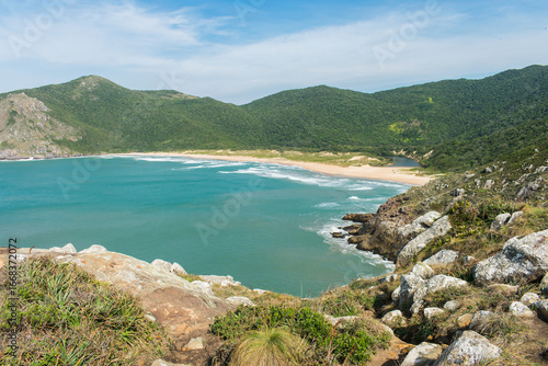 A view of Lagoinha do Leste beach, from the Matadeiro hiking path. Isolated beach in the south of Florianopolis island - Brazil