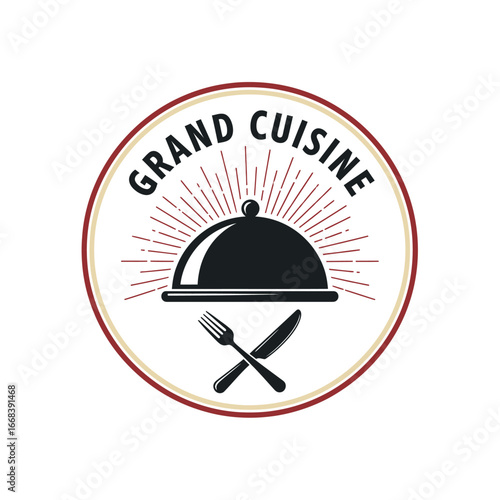 A sophisticated logo for a restaurant, featuring a cloche, crossed cutlery, and the words 'Grand Cuisine'.