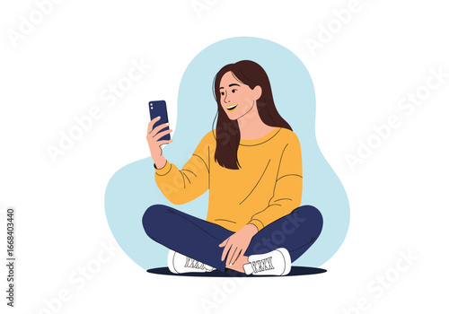 Young woman taking a selfie while sitting in a comfortable pose holding a smartphone