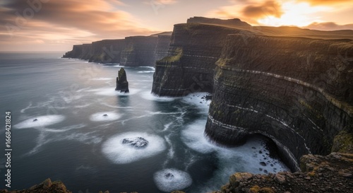 Dramatic Cliffs of Moher at Sunset, Ireland, with Sea Stacks and Long Exposure Waves