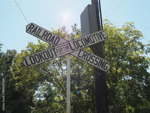 The sign says to be on the lookout for the locomotive. 