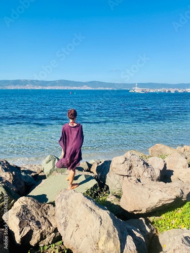 man sitting on a rock