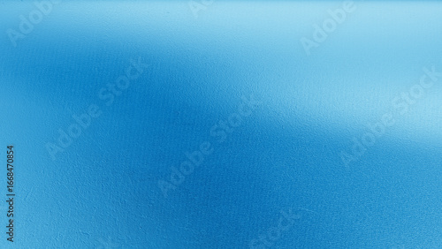 Abstract close-up of metallic blue foil texture with reflective details and smooth gradient tones, ideal for modern, festive, or design backgrounds.