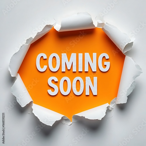 Bright orange background revealed through torn white paper with the words coming soon