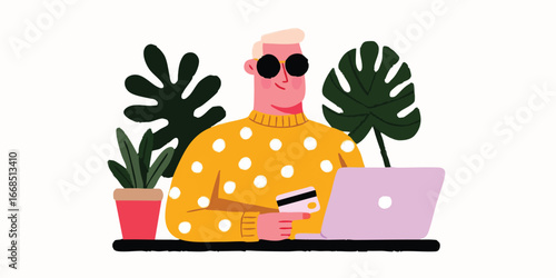 A stylish individual engages in online shopping. Using his credit card to purchase, He sits beside green leafy plants.