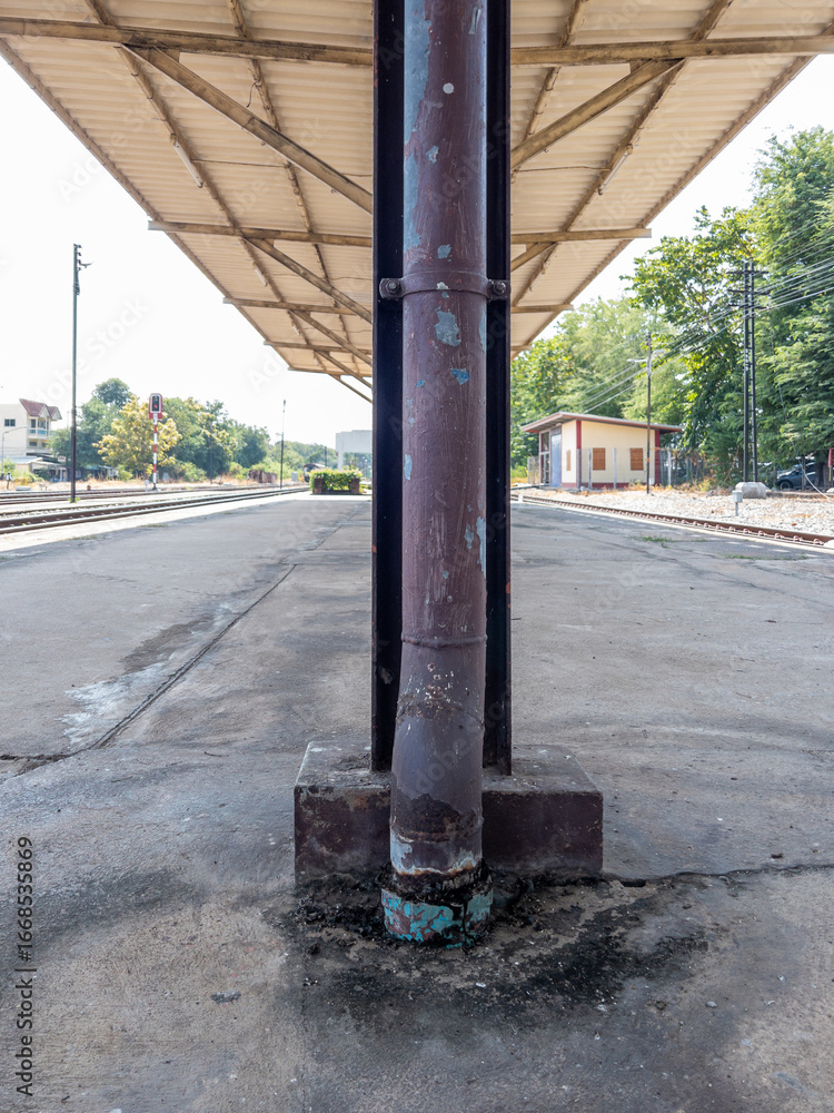 Fototapeta premium Rain Gutter on Column of Train Station Platform.