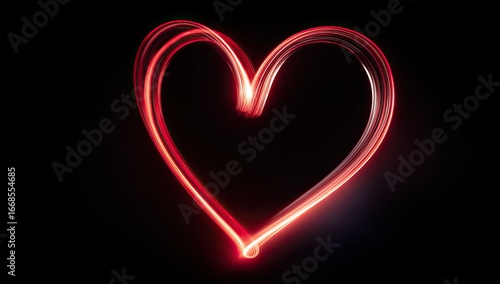 A vibrant, red-toned heart shape created with light painting on a black background