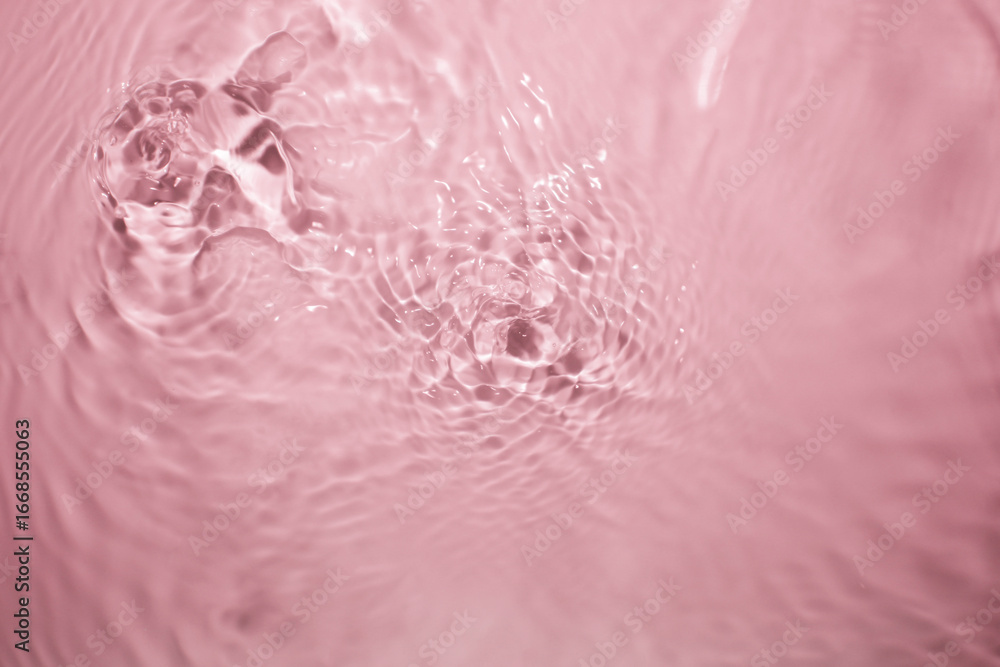 Fototapeta premium Gentle Water Ripples with Soft Pink Background and Elegant Texture
